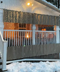 Kickass Clear PVC Tarp Curtains With A Seamless Zipper Door And Heavy Gauge Grommets create shelter on a snowy porch.