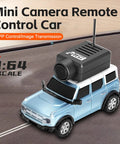 WLtoys 1 To 64 Scale Mini RC Car With 720P HD FPV Camera on a table showcasing app control and blue color