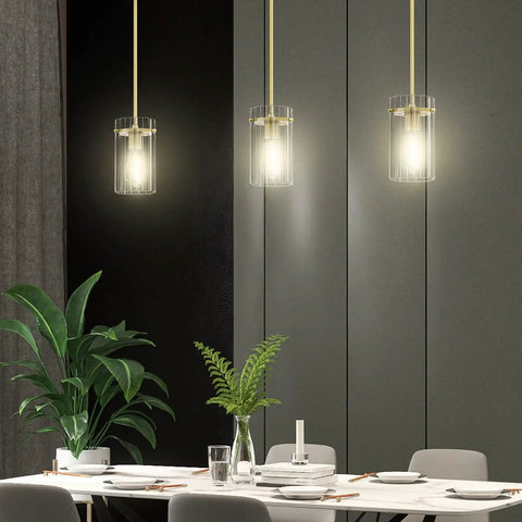 3 Pack Modern Gold Pendant Lights With 5.3 Inch Clear Glass Shades, Brushed Brass Finish, E26 Base, above dining table