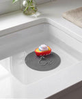 TEHAUX Silicone Bathtub Drain Stopper 6'', Hair Catcher for Bathroom with boat design in white sink.