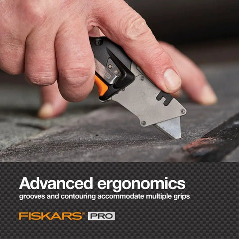 Pro Retractable Folding Utility Knife With CarbonMax Blade, Dual Lock Safety cutting material, close-up view