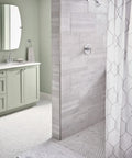 Bathroom with shower featuring Gibson Chrome Posi Temp Shower Trim With Pressure Balancing Eco Performance, curtain and vanity.