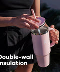 On The Fly 40 Oz Stainless Steel Travel Tumbler With Comfort Grip Handle And Leak Proof Straw Lid shown with lid and straw.