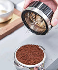 Slick 58mm Coffee Distributor Needle With Geared Spinning Action And Sturdy Black Base, leveling coffee grounds in portafilter.