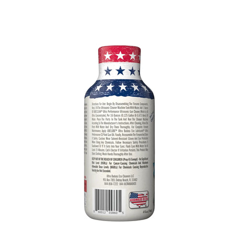 Heavy Hitting Ultrasonic Gun Cleaner 4X Ultra Concentrated Solution 4 Oz bottle with red, white, and blue design, detailed instructions on back.