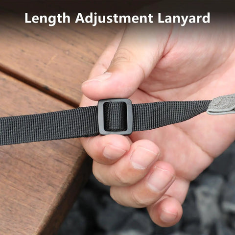 Soft Leather Lanyard For DJI RC Series Remotes length adjustment feature shown in hand, black strap with buckle.