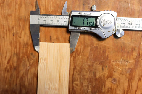 Flattened Bamboo For Bow Making And Woodworking Build Bows And Bendable Projects with caliper measurement showing width