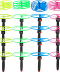 Awesome Flying Saucer Toy Set With 32 Discs And 16 String Launchers showing colorful discs and launchers arranged upright.