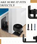 4 Pieces Sliding Closet Barn Door Floor Guide Kit With Flush Wall Mount Design And Bottom Adjustable Roller shown installed.