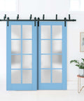 Interior Barn Bypass Sliding Doors With Frosted Glass And Solid Wood, 84 By 96 Inches, Black Finish, installed in a room
