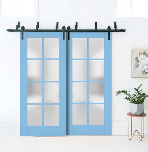 Interior Barn Bypass Sliding Doors With Frosted Glass And Solid Wood, 84 By 96 Inches, Black Finish, installed in a room