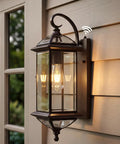 Solid Copper Dusk To Dawn Outdoor Wall Light With Clear Beveled Glass In Oil Rubbed Bronze, 18.5 Inch Exterior Wall Sconce, mounted
