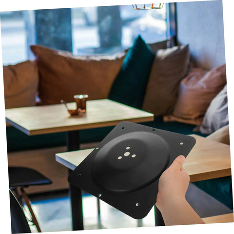 Built Different Square Metal Table Leg Connectors Quick Snap Fit Design For Reliable Sofa And Bench Hardware Straight Setup Heavy Duty Black Iron Furniture Mounting Plates held in hand.