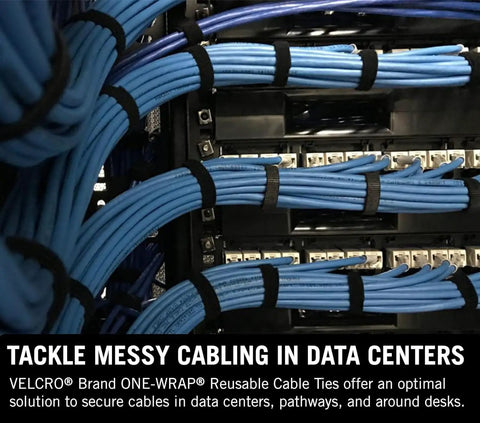 One Wrap Tape Three Quarter Inch By Twenty Five Yard Double Sided Self Gripping Roll securing blue cables in a data center