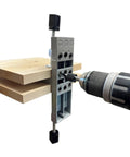 Pro Doweling Kit With Pre-Aligned Hole Guides And Hardened Steel Bushings, clamped to wood for accurate drilling