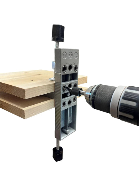Pro Doweling Kit With Pre-Aligned Hole Guides And Hardened Steel Bushings, clamped to wood for accurate drilling