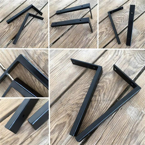 Heavy Duty Wall Mounted L Shape Shelf Brackets Two Pack Slick Black Finish Rust Proof Steel for Pantry Or Deck on wooden surface.