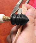 Hella Smooth Rotary Leather Burnisher Bits Set With Multi Groove Polishing Heads For Precision Edge Shaping on leather edge in hand.