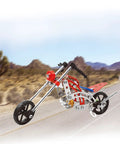 99 Piece Metal Motorcycle Model Building Kit For DIY Chopper Bike Fans And STEM Lovers in red and silver on a desert road