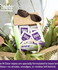 Flents Wipe N Clear lens wipes packets in a green box inside a gift basket with sunglasses