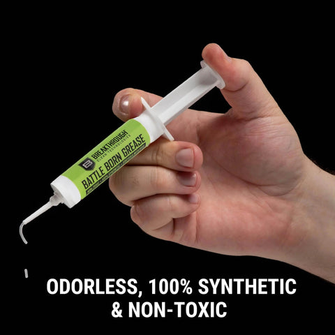 Gun Grease For Corrosion Protection 12cc Syringe Pro Grade Firearm Lubricant With Pure Synthetic Oils And Sub Micron PTFE in hand