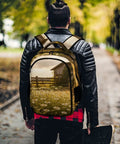 Man wearing Sunset Daisy Barn Farm Printed Unisex Backpack with large capacity, walking in park
