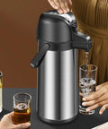 Serving coffee with Party-Ready Hot Beverage Dispenser With Pump, 1.9L Insulated Stainless Steel Carafe at a gathering.