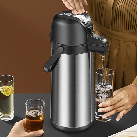 Serving coffee with Party-Ready Hot Beverage Dispenser With Pump, 1.9L Insulated Stainless Steel Carafe at a gathering.