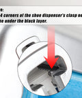 Close-up of Automatic Shoe Covers Dispenser clasp showing instruction to secure corners under black layer for secure fit.