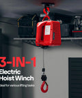 Front view of red 3-in-1 electric hoist winch hanging from ceiling with wire rope and hook