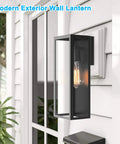 Top Shelf Matte Black Outdoor Wall Lights, Rock Solid Weather Resistant Exterior Sconces With Sturdy Clear Glass Panels, Rust Proof Patio Porch Lanterns Built Like A Tank For Your Yard mounted on a wall, showcasing clear glass and a vintage bulb.