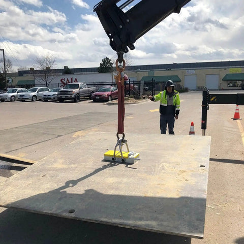 Heavy Duty Switchable Lifting Magnet With 12000 Pounds Breakaway Force in use on large steel plate during outdoor lift.