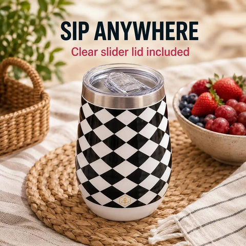 Premium Double Wall Insulated Stemless Wine Tumblers With Slider Lids 12 Oz Set on table with fruit and clear lid.