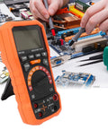 Go To Insulation Resistance Tester Megohmmeter for Electrical Equipment Maintenance in use on circuit board with probes in hand