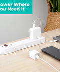 Six-Outlet Surge Protector Power Strips 2-Pack 900 Joule Protection 4-Foot Cord Lighted Switch on desk with devices