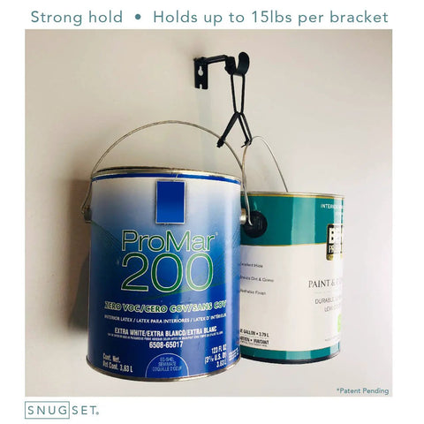 Wall-mounted hook holding two paint cans, demonstrating strong hold up to 15lbs per bracket.