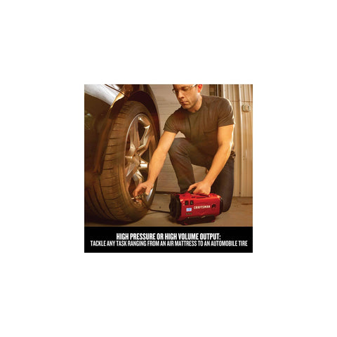 Man using V20 Tire Inflator Portable Air Compressor With Cordless 120V Corded And 12V Car Adapter Modes on car tire in garage