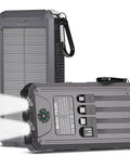Solar Charger Portable 20000mAh Battery Pack With USB C And Dual LED Flashlights, showing cables and compass, for outdoor use.