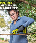 Woman using Heavy Hitter 18 Volt Cordless Bypass Pruner to trim a branch in a garden setting.