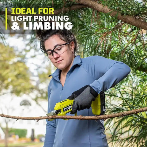Woman using Heavy Hitter 18 Volt Cordless Bypass Pruner to trim a branch in a garden setting.