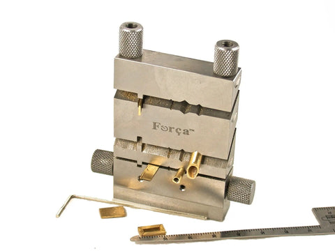 Slick Jewelry Miter Vise For Exact Tube And Wire Cutting At Forty Five To One Thirty Five Degrees with metal parts and tools.