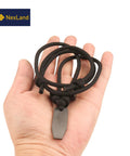 Hand holding Ceramic Striker Fire Starter Necklace With Ferro Rod Toggle And Paracord All In One Bushcraft Emergency Fire Starter Kit.