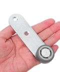 Premium 6 Pack Silver Sliding Door Roller Casters With Reinforced Steel Core And TPE Wheels Includes Anti Sagging Floor Guide For Barn Doors That Glide Damn Smooth Every Time held in hand displaying gray wheel.