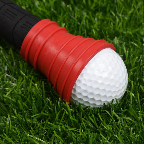 Golf Ball Retriever with Suction Cup Tool in red rubber picking up a golf ball from grass