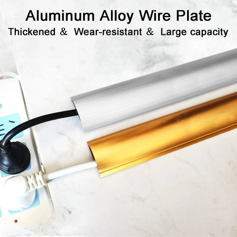Rock Solid Aviation Aluminum Floor Cable Cover With Dual Channel Wire Routing Design And Slick Brushed Finish Heavy Cord Protector For Clean Home Office Setup A Real Game Changer For Wire Clutter showcasing silver and gold wire plates.