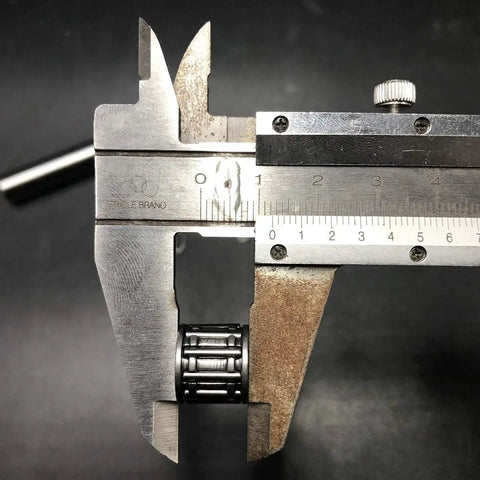 Close-up of needle bearing from 10mm Piston Pin And Needle Bearing Kit For 2 Stroke 100cc Gas Motorized Bicycle Replacement