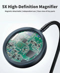 5X magnifying glass on a Versatile Soldering Station With 5X Magnifying Glass, Magnetic Helping Hand And 4 Flexible Arms For Soldering, Assembly, And PCB Repair, Adjustable Vise, 360 Degree Rotation, Perfect For Tinkerers, Hobbyists And Pros magnifying a PCB chip