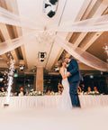 Wedding ceremony with a couple dancing under a 24 Inch Round Ceiling Canopy Hoop Hardware Kit White Metal For Ceiling Drape Hanging Ring, Easy Install Drape Kit For Wedding Ceremony Decor, Ceiling Draping Hoop Ring With Mounting Hardware, Drapes Not Included