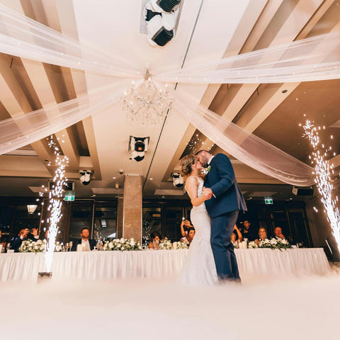 Wedding ceremony with a couple dancing under a 24 Inch Round Ceiling Canopy Hoop Hardware Kit White Metal For Ceiling Drape Hanging Ring, Easy Install Drape Kit For Wedding Ceremony Decor, Ceiling Draping Hoop Ring With Mounting Hardware, Drapes Not Included