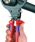 Hand holding 95 31 280 SBA Copper And Aluminum Cable Cutters With One Hand Ratchet, cutting copper cable, precision ground blades.